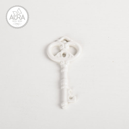 Chiave bianca in ceramica 9,2x4,2x0,5cm