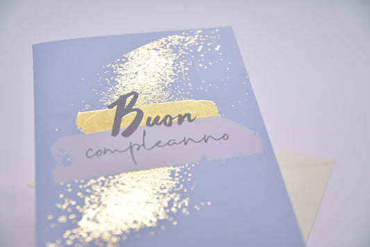 Biglietto di auguri per compleanno azzurro con oro